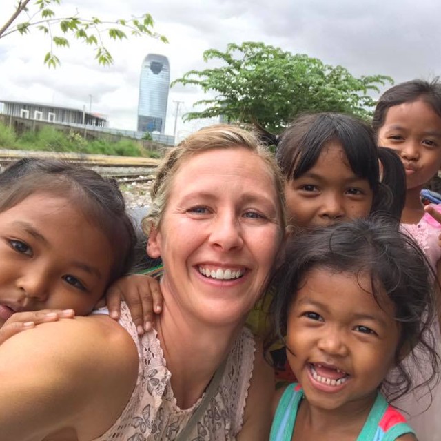 Brenda with kids in slum