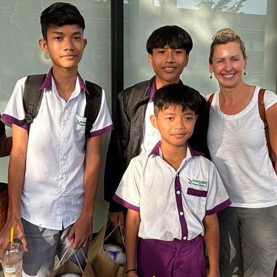 Brenda and Children from the Education Sponsorship Program