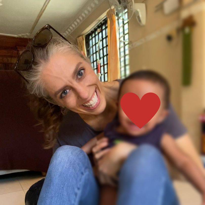 Missionary Amy Learn with a Child